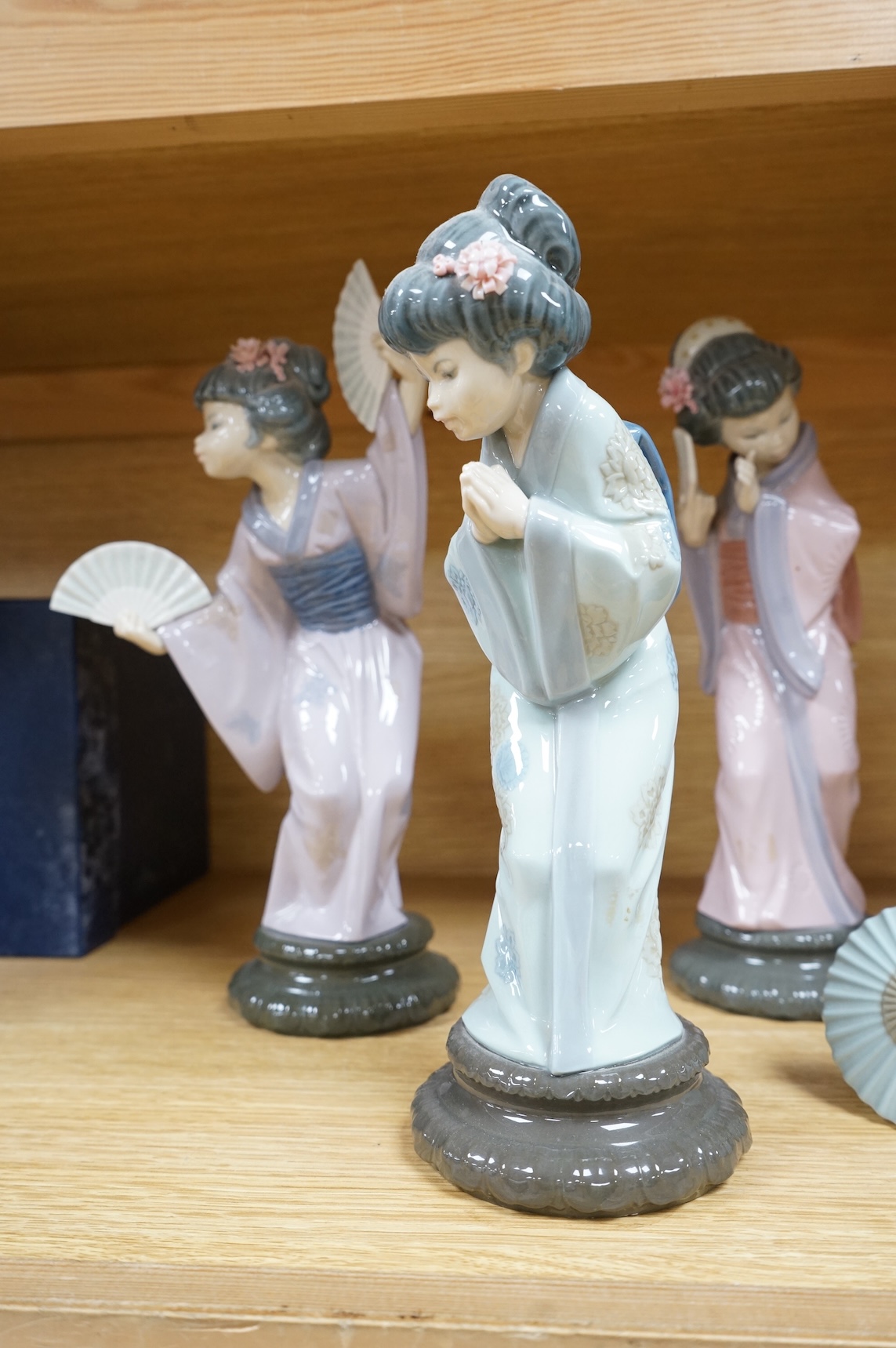 Four Lladro models of Geishas, tallest 30cm